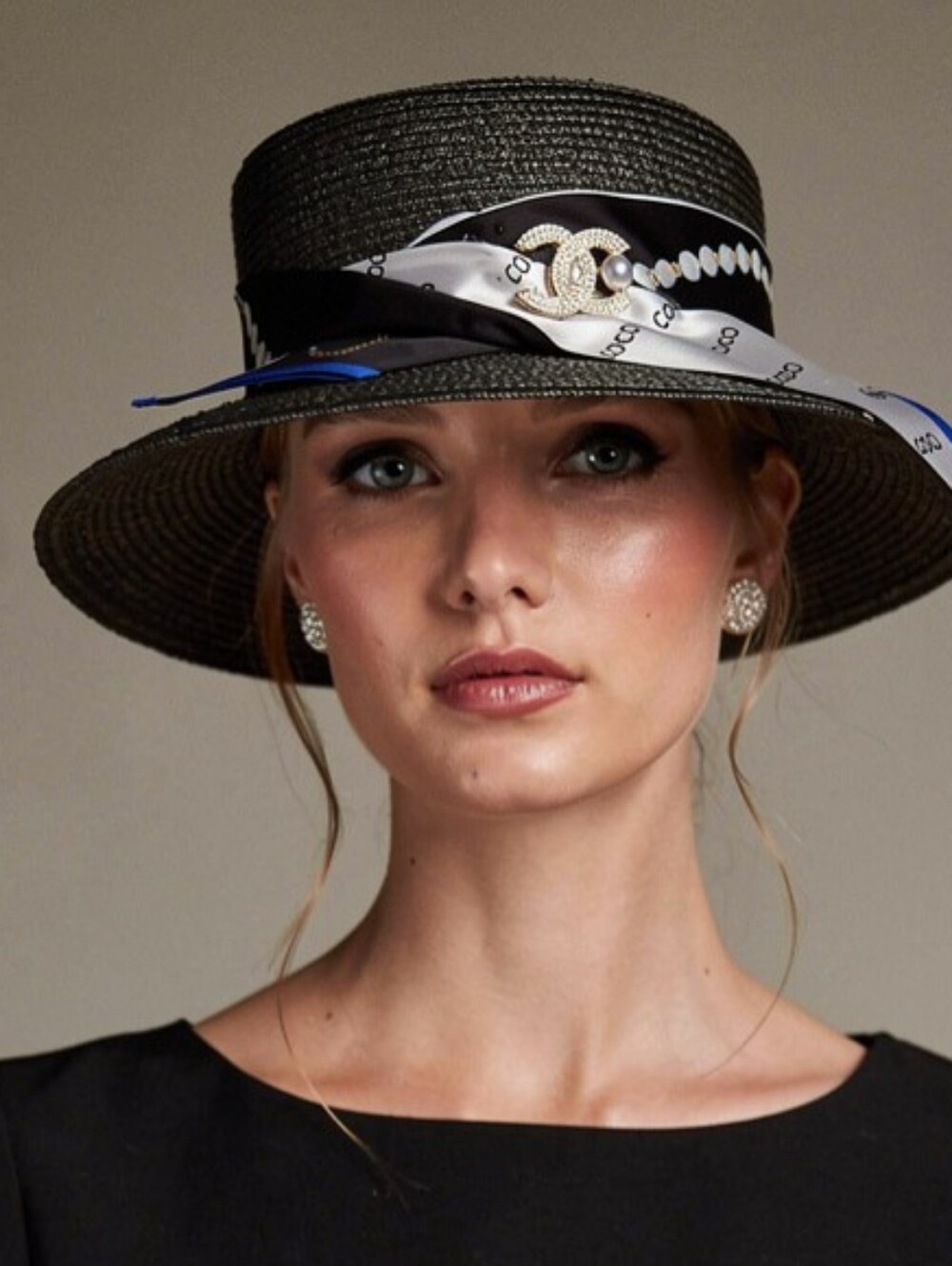 Elegant Black Straw Boater Hat with Patterned Silk Scarf Trim